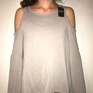 gray open back flouncy shirt